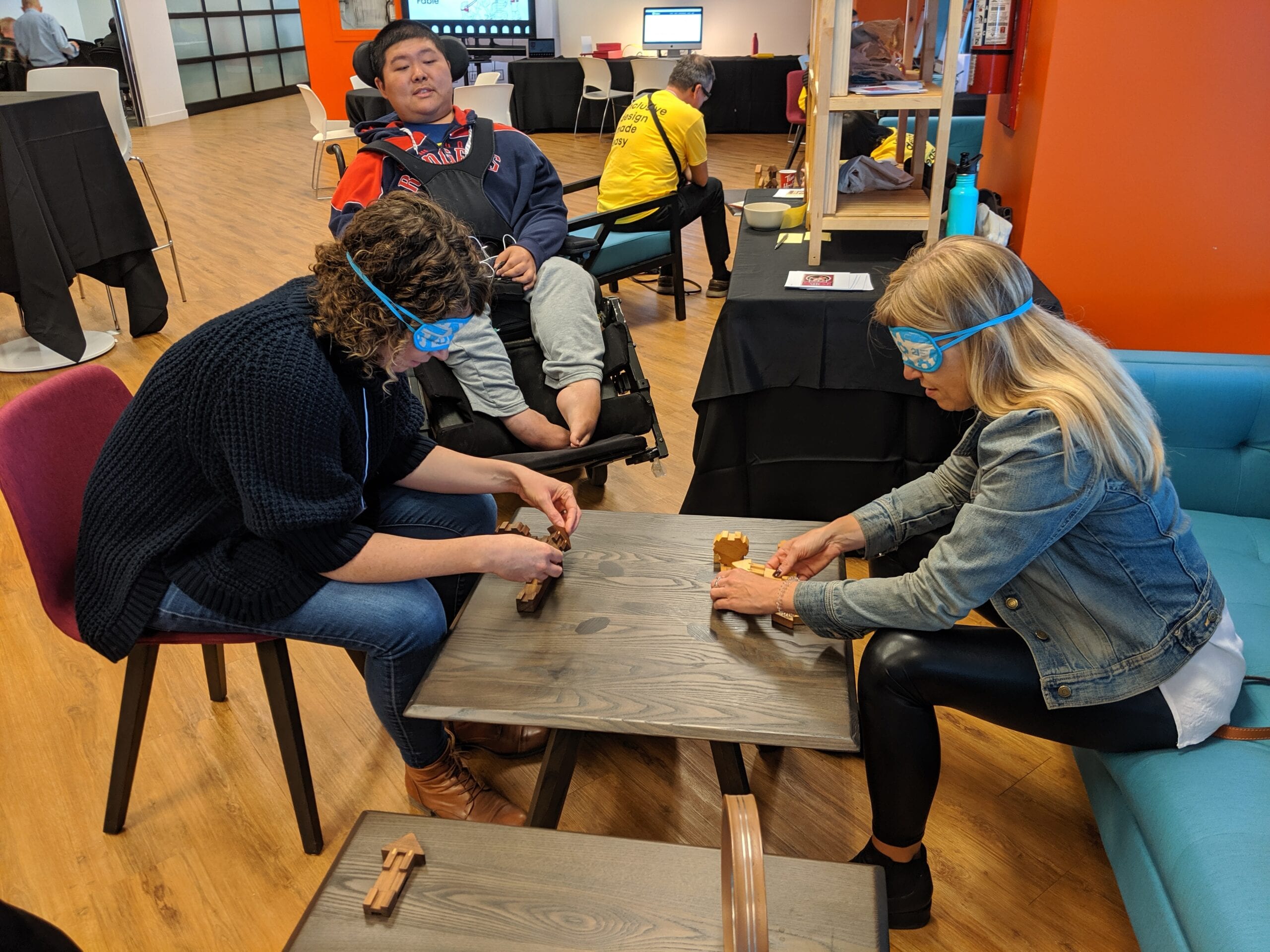 Leo, Tonja and Jamie play with 21 Toys' Empathy Toy at a Fable event